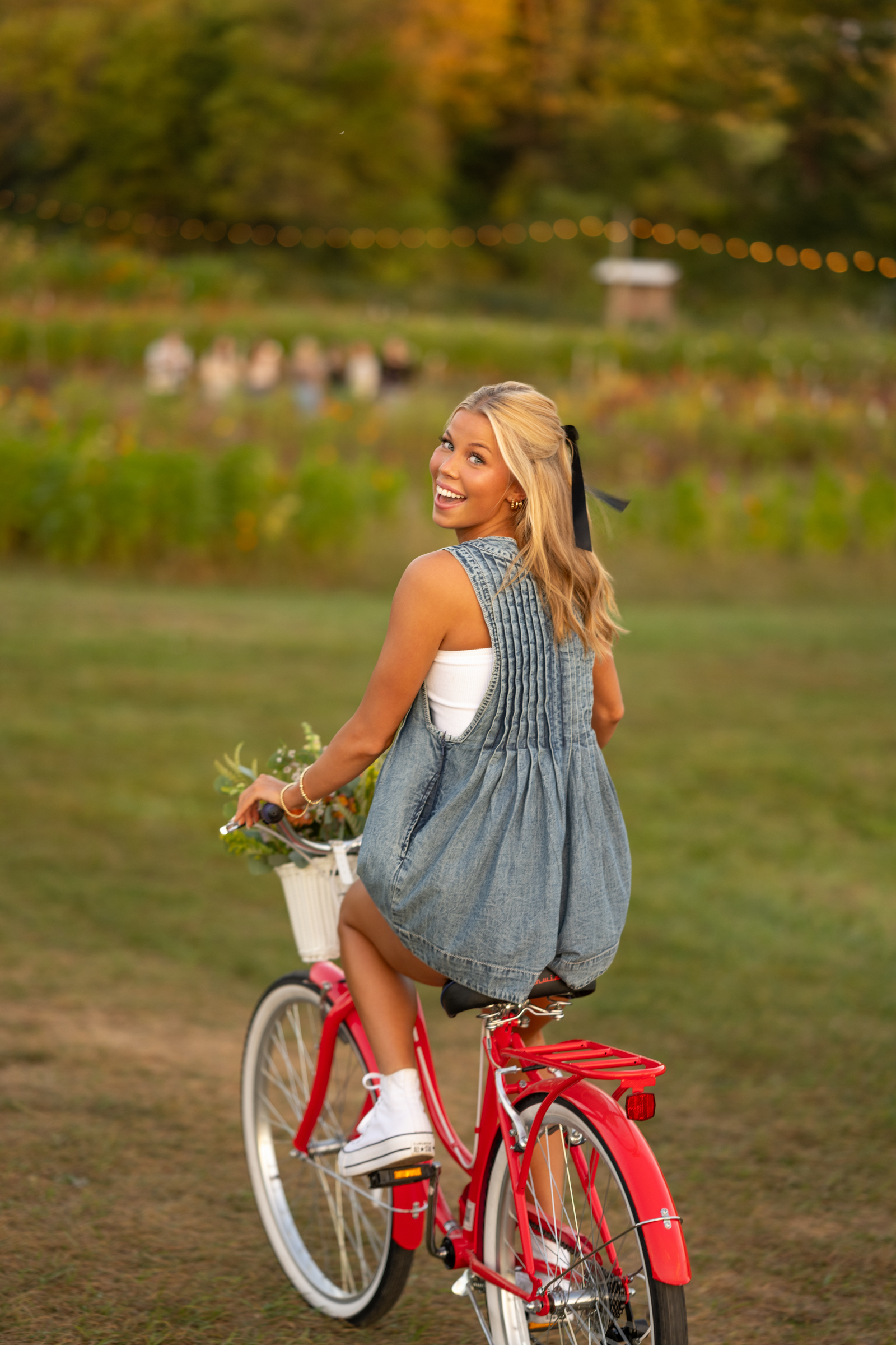 High school senior portraits in Iowa City with natural light and wildflowers