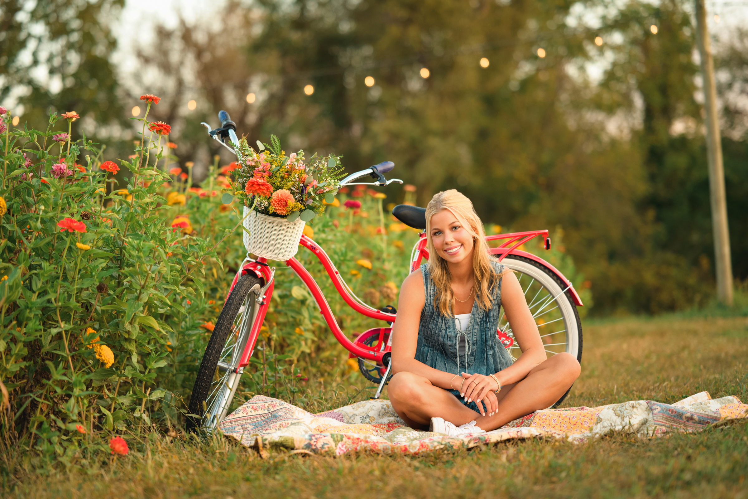 Iowa City high school senior smiling in a wildflower meadow